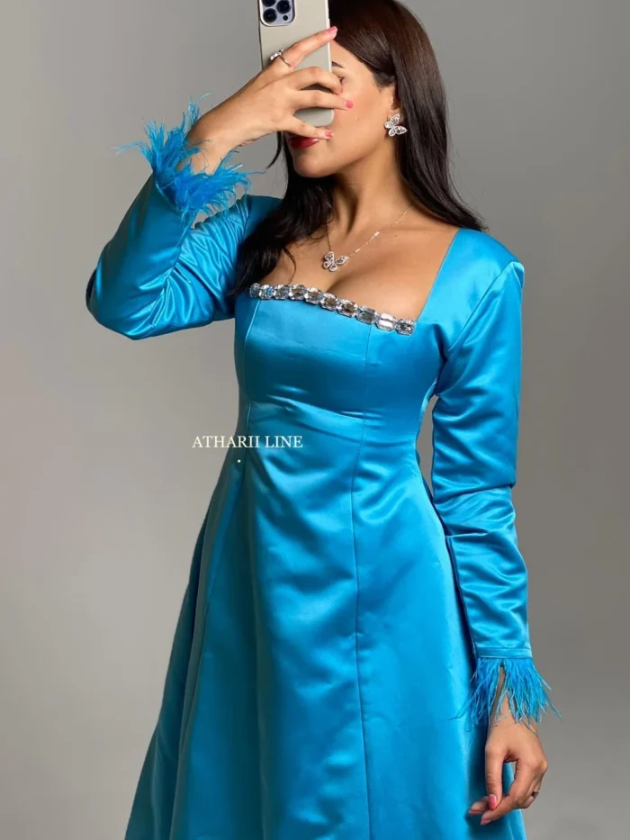 woman wearing blue dress