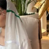 woman wearing uae flag shela